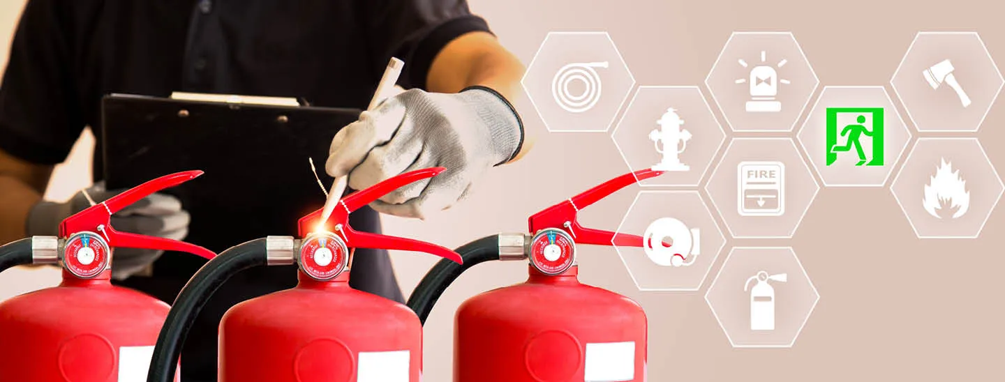 Inspector evaluates fire extinguisher condition next to multiple fire safety icons