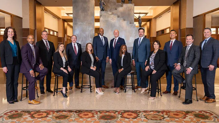 Diversity and inclusion team gathered in a professional setting, representing commitment to workplace equity and collaborative culture.