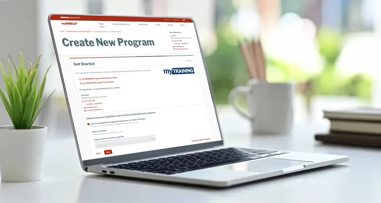 Laptop computer with Create New Program screen for myTRAINING Program